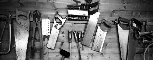 An array of carpenter's tools on the wall